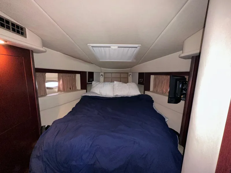 Slide: The Image of Interior of 2007 Sea Ray 36 Sedan Bridge with cozy bed. - 15