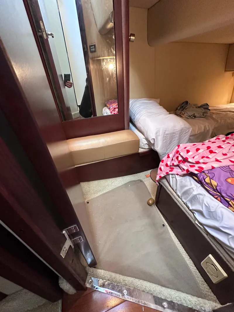 Slide: The Image of Interior of 2007 Sea Ray 36 Sedan Bridge with bed and mirror. - 18
