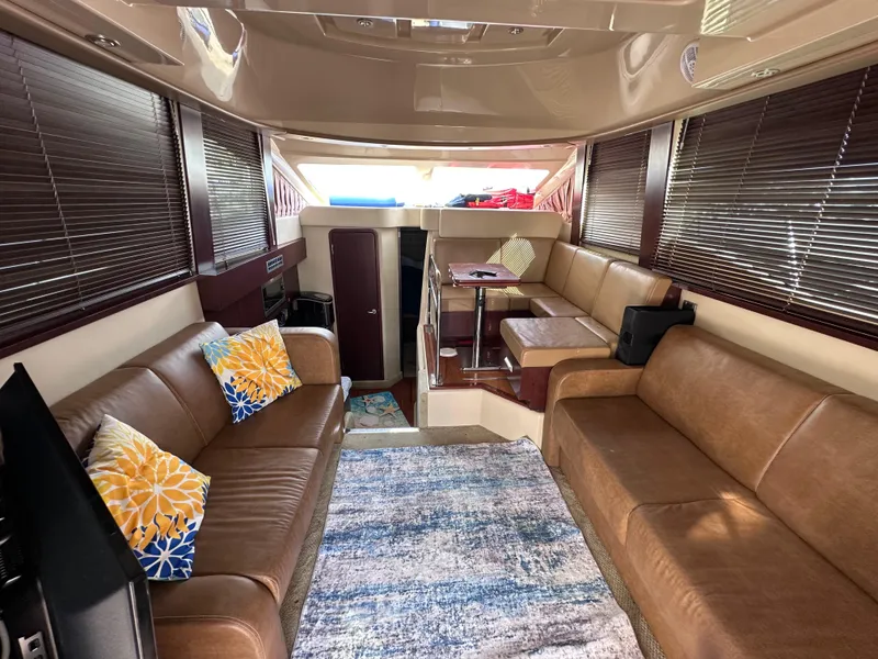 Slide: The Image of Interior of 2007 Sea Ray 36 Sedan Bridge with leather sofas. - 27