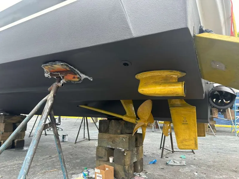 Slide: The Image of Underside of a 2007 Sea Ray 36 Sedan Bridge boat on blocks. - 44