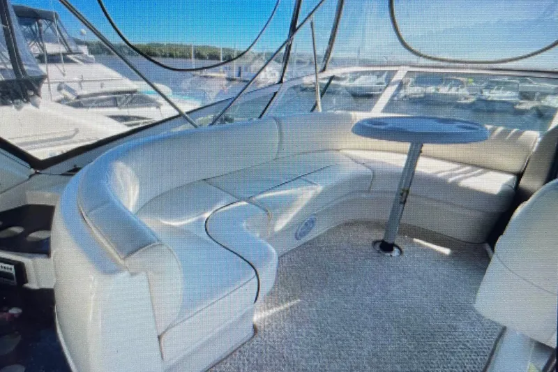 Slide: The Image of Luxurious interior of 2006 Cruisers Yachts 385 Motoryacht with plush seating and table. - 11