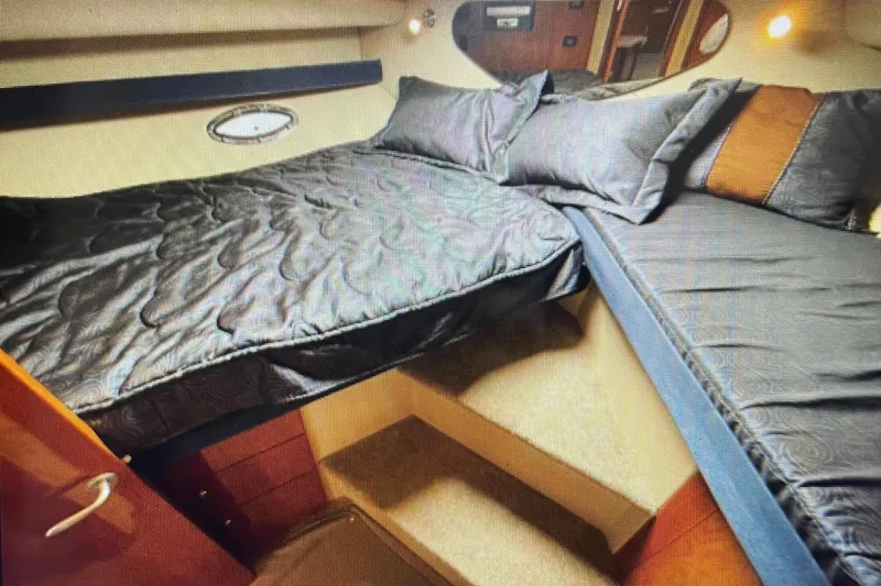Slide: The Image of Luxurious cabin interior of 2006 Cruisers Yachts 385 Motoryacht with cozy bedding. - 18