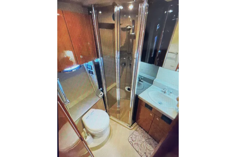 Slide: The Image of Luxurious bathroom in 2006 Cruisers Yachts 385 Motoryacht with shower and vanity. - 19