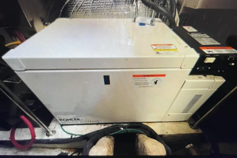 Slide: The Image of Kohler power system in 2006 Cruisers Yachts 385 Motoryacht engine room. - 23