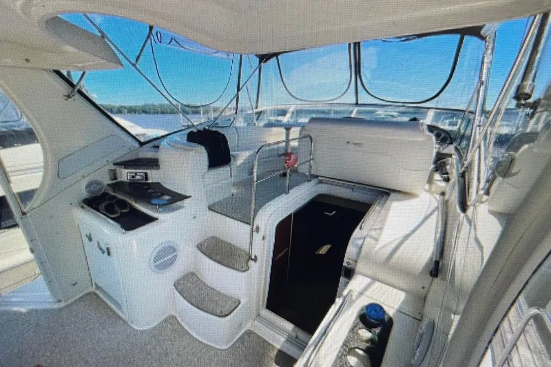 Slide: The Image of 2006 Cruisers Yachts 385 Motoryacht interior with helm and seating area. - 5