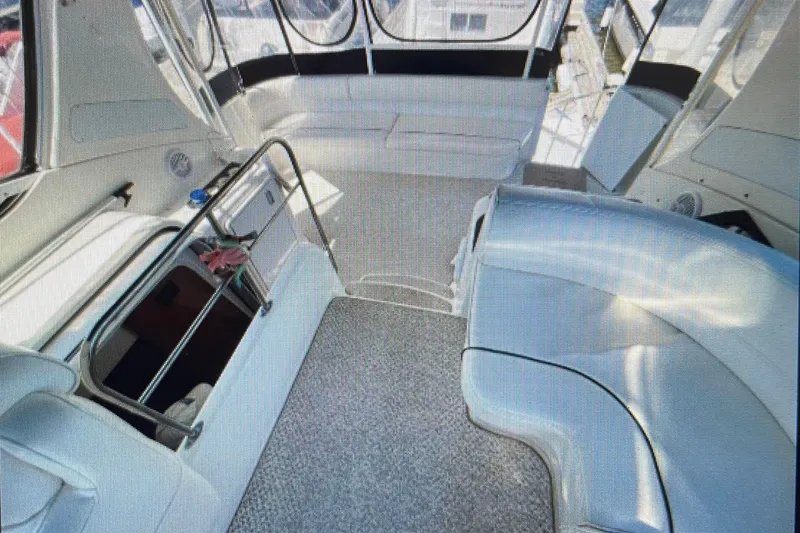 Slide: The Image of 2006 Cruisers Yachts 385 Motoryacht interior with sleek seating and modern design. - 9