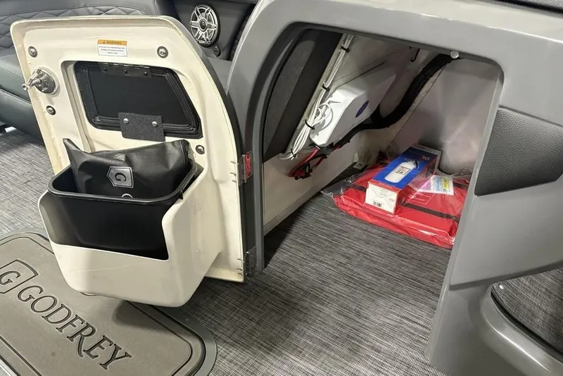 Slide: The Image of Interior storage compartment of 2026 Godfrey Monaco 235 SB iMPACT pontoon boat. - 14