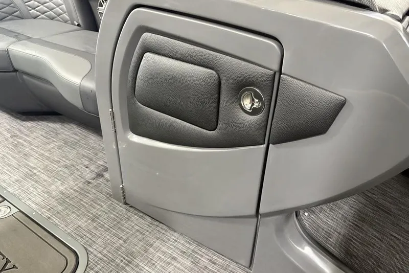 Slide: The Image of Interior of 2026 Godfrey Monaco 235 SB iMPACT pontoon boat, featuring sleek seating and storage. - 15