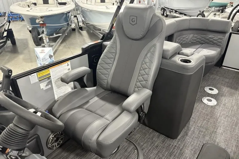 Slide: The Image of Luxurious interior of 2026 Godfrey Monaco 235 SB iMPACT pontoon boat with plush seating. - 19