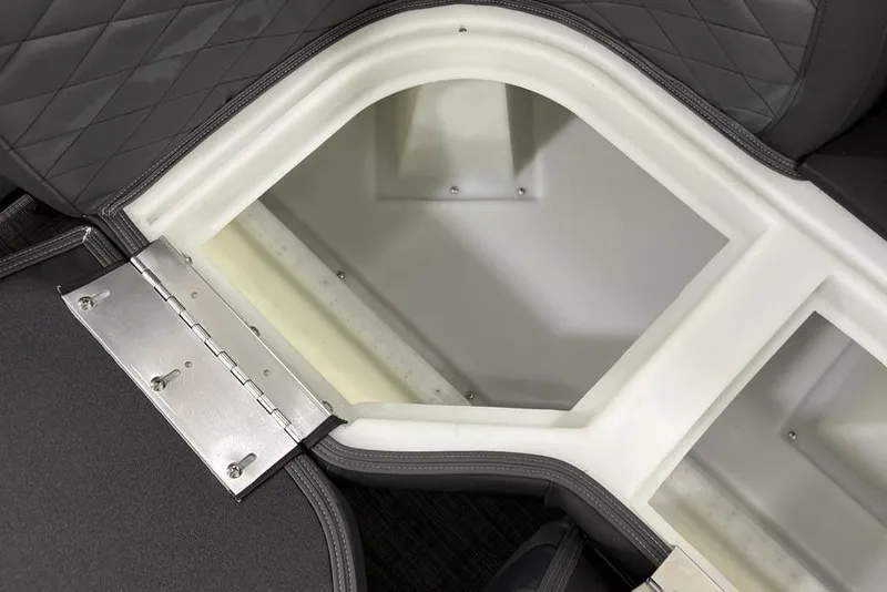 Slide: The Image of Storage compartment in 2026 Godfrey Monaco 235 SB iMPACT Package boat, featuring quilted upholstery. - 24