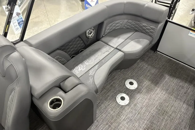 Slide: The Image of Luxurious seating in 2026 Godfrey Monaco 235 SB iMPACT pontoon boat, featuring sleek gray upholstery. - 30