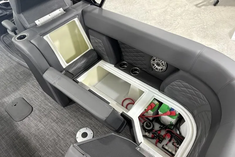 Slide: The Image of Interior view of 2026 Godfrey Monaco 235 SB iMPACT, featuring storage compartments and speaker. - 31