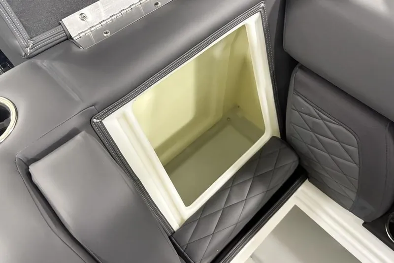 Slide: The Image of 2026 Godfrey Monaco 235 SB iMPACT Package seat storage with quilted upholstery detail. - 32