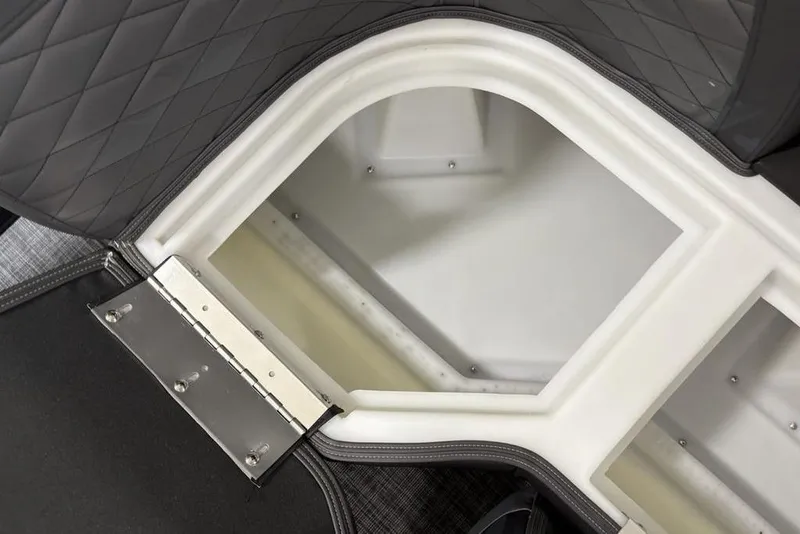 Slide: The Image of Storage compartment in 2026 Godfrey Monaco 235 SB iMPACT Package boat, featuring quilted upholstery. - 4