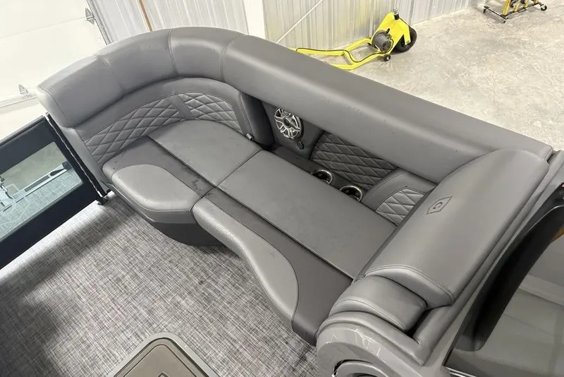 Slide: The Image of Luxurious seating on 2026 Godfrey Monaco 235 SB iMPACT pontoon boat, featuring quilted upholstery. - 5