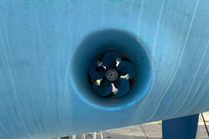 Slide: The Image of Bow thruster of a 2003 Beneteau 423 sailboat, close-up view. - 46