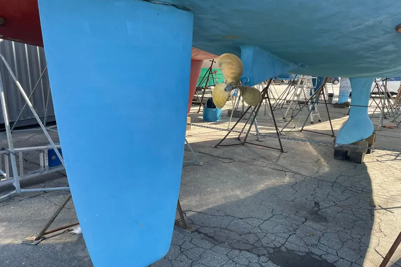 Slide: The Image of Underwater view of a 2003 Beneteau 423 sailboat with visible propeller and keel. - 48