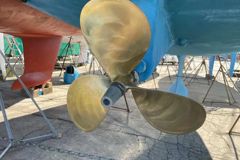Slide: The Image of Propeller of a 2003 Beneteau 423 sailboat on dry dock. - 49