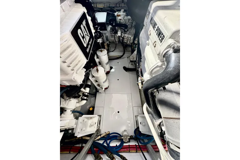 Slide: The Image of Engine room of 1991 Garlington 44 Express with CAT marine power components. - 27