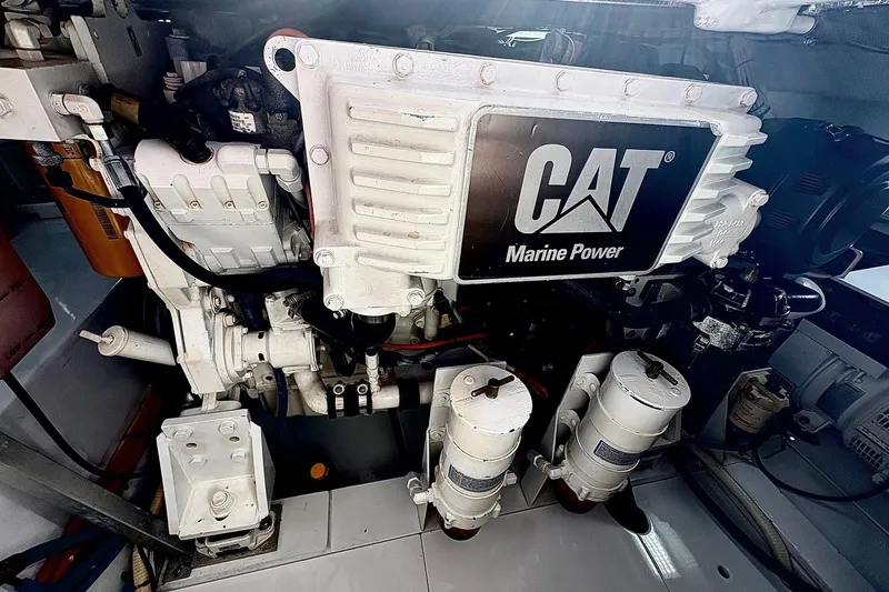 Slide: The Image of Engine room of 1991 Garlington 44 Express with CAT Marine Power engine. - 28