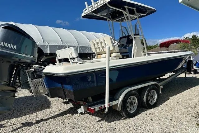 Slide: The Image of 2014 ShearWater 25 LTD boat on trailer with Yamaha engine, parked outdoors. - 4