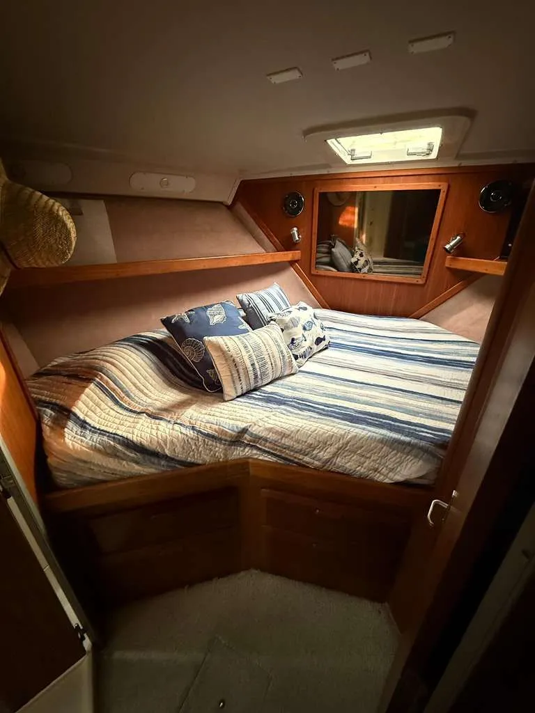 Slide: The Image of Cozy cabin of the 1995 Luhrs Tournament 350 yacht. - 16