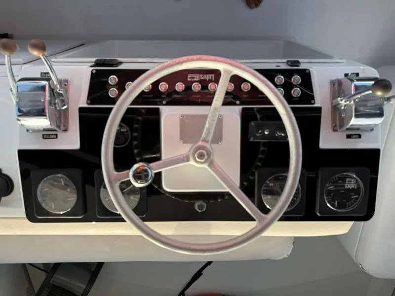Slide: The Image of Helm console of a 1995 Luhrs Tournament 350 boat. - 22