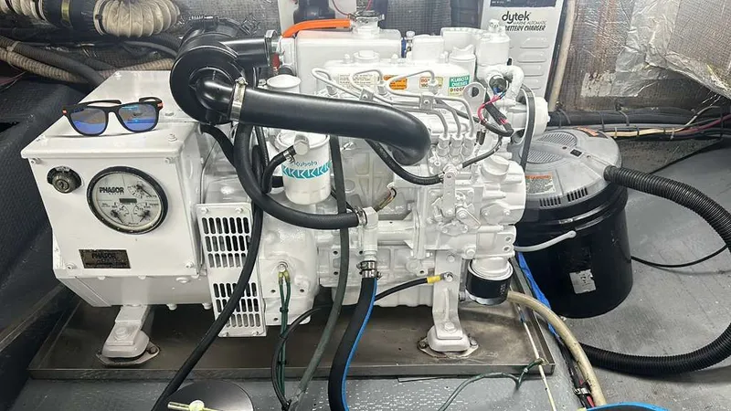 Slide: The Image of Engine room of a 1995 Luhrs Tournament 350 with generator. - 24