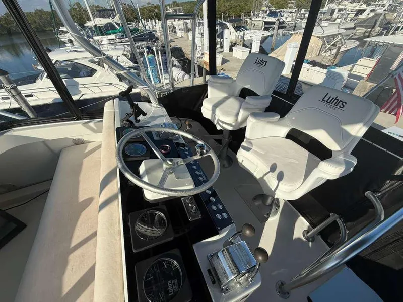 Slide: The Image of Interior of a 1995 Luhrs Tournament 350 boat at the marina. - 25