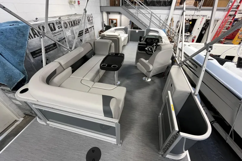 Slide: The Image of 2026 Godfrey Sweetwater 2086 CP pontoon boat interior with seating and helm. - 33