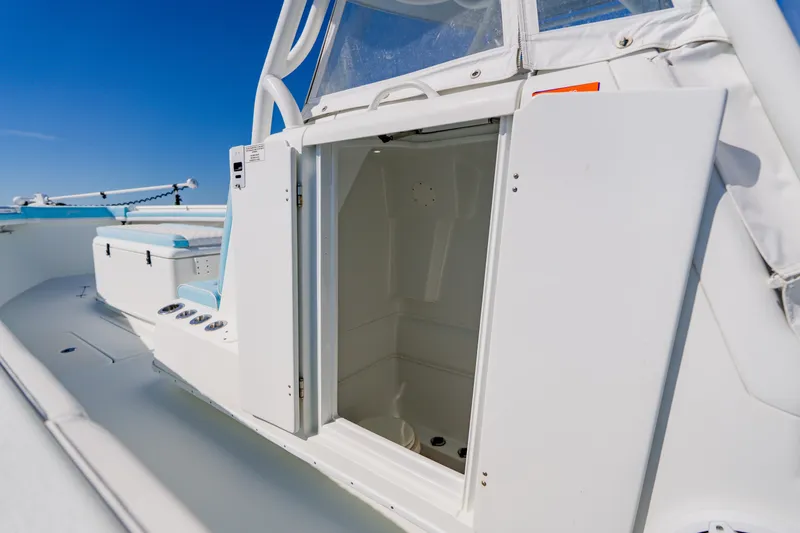 Slide: The Image of 2015 Yellowfin 39 Offshore boat interior with open cabin door. - 26