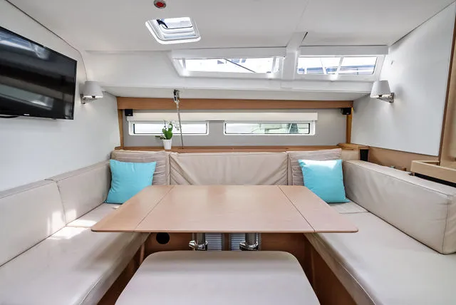 Slide: The Image of Captain's chair on 2025 Jeanneau NC 895 Series 2 boat, featuring sleek design and comfort. - 24