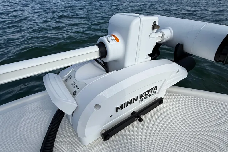 Slide: The Image of Minn Kota Terrova motor on 2024 Boston Whaler 210 Montauk boat, on water. - 13