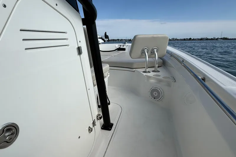 Slide: The Image of 2024 Boston Whaler 210 Montauk boat interior with seating and ocean view. - 15