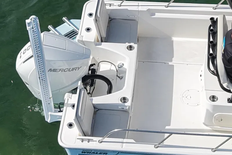 Slide: The Image of 2024 Boston Whaler 210 Montauk boat with Mercury engine, aerial view. - 5
