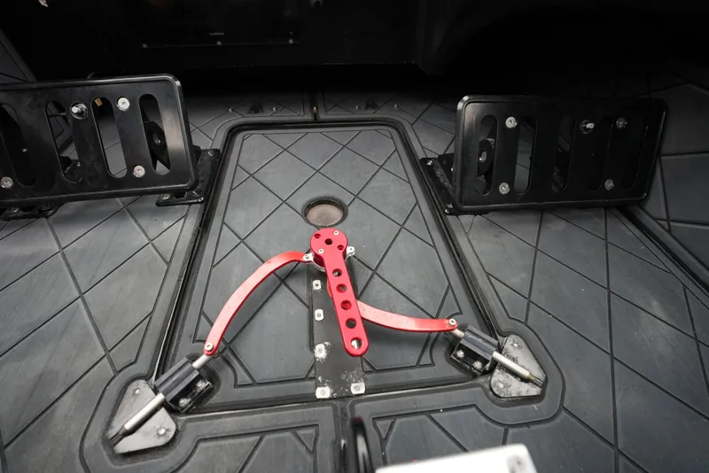 Slide: The Image of Interior of a 2019 Doug Wright 32 boat with red lever and black fittings. - 13