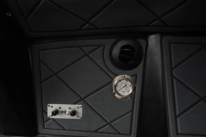 Slide: The Image of Control panel of 2019 Doug Wright 32 boat with gauge and switches. - 17