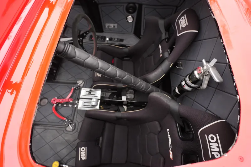 Slide: The Image of Interior of 2019 Doug Wright 32 boat with OMP racing seats and safety equipment. - 21