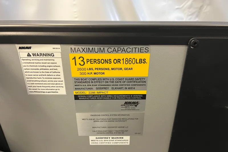 Slide: The Image of 2026 Godfrey Sweetwater 2286 MT capacity label: 13 persons, 1860 lbs, 300 HP motor. - 30