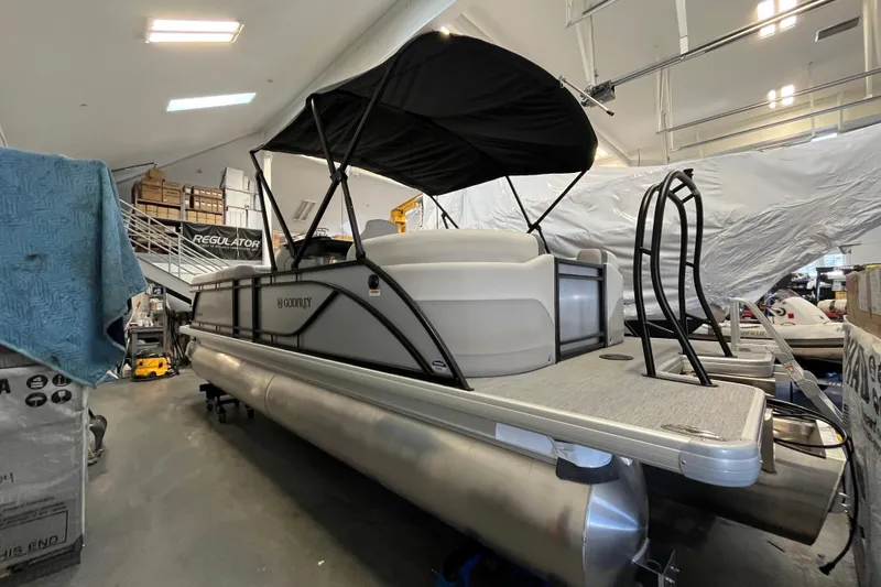 Slide: The Image of 2026 Godfrey Sweetwater 2286 MT pontoon boat in indoor storage facility. - 6