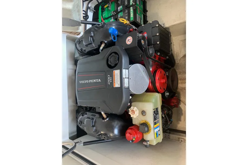 Slide: The Image of Volvo Penta engine in 2017 Cobalt 220S boat, showcasing mechanical components. - 27