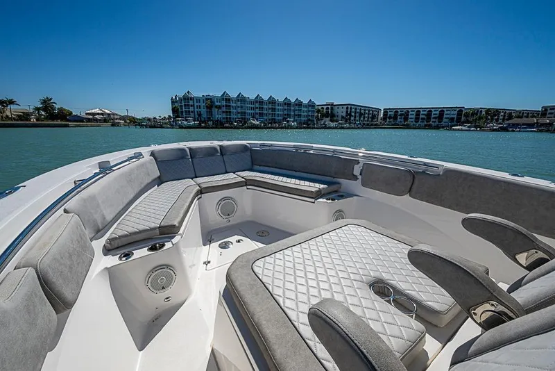 Slide: The Image of Luxurious seating on 2018 Sea Fox 328 Commander boat with waterfront view. - 9