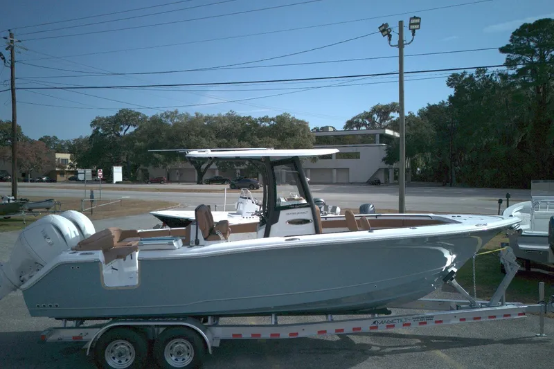 The Image of 2026 Sea Hunt Ultra 275 SE boat on trailer in outdoor setting. - 1