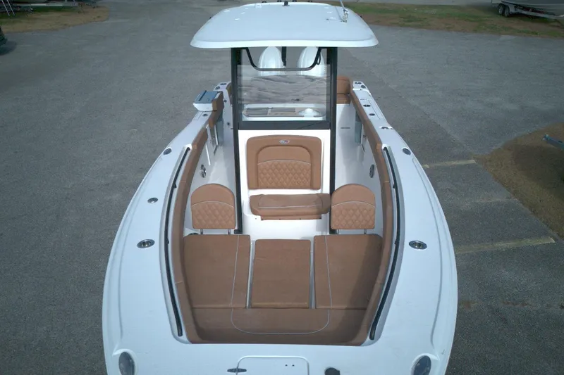 Slide: The Image of 2026 Sea Hunt Ultra 275 SE boat with spacious seating and modern design. - 10