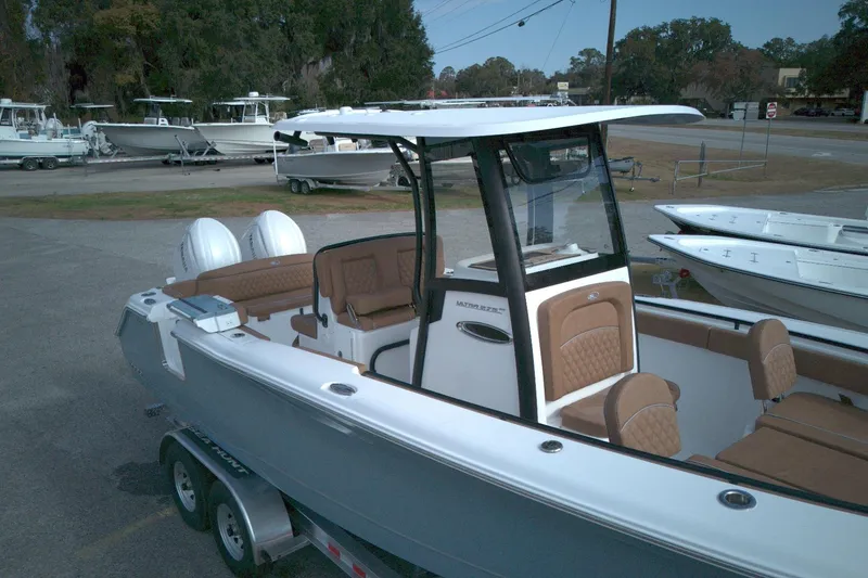 Slide: The Image of 2026 Sea Hunt Ultra 275 SE boat with dual engines and spacious seating. - 4