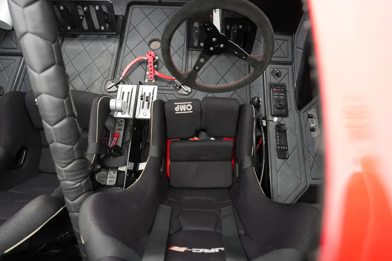 Slide: The Image of Interior of 2019 Wright Performance 320 Race boat with racing seats and steering wheel. - 15