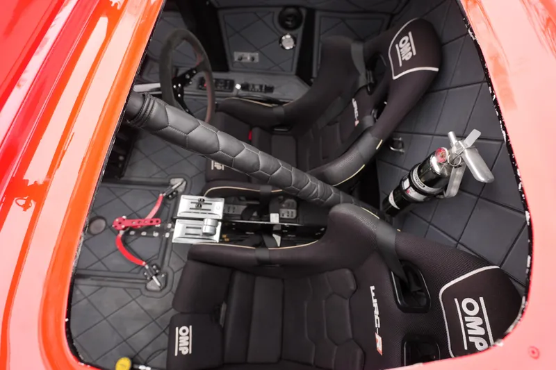 Slide: The Image of Interior of 2019 Wright Performance 320 Race car with OMP racing seats and safety equipment. - 16