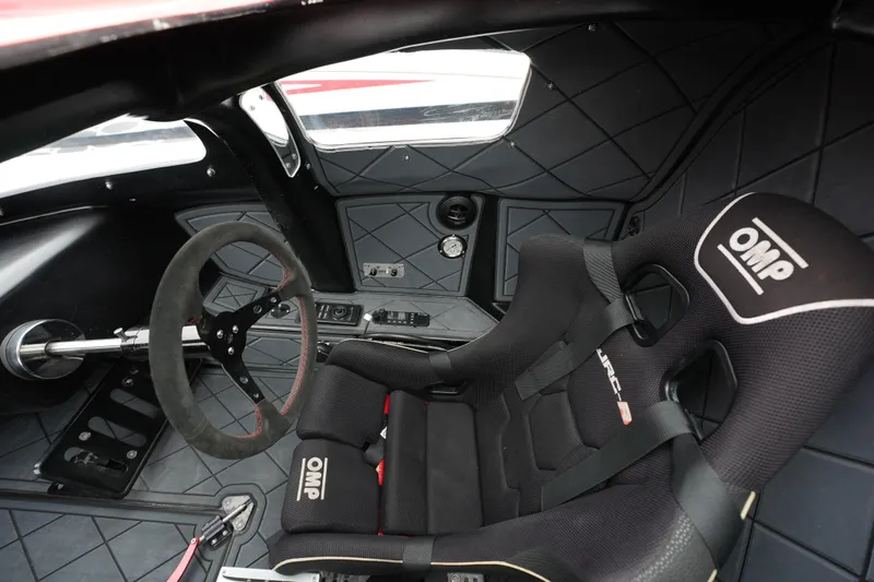 Slide: The Image of Interior of 2019 Wright Performance 320 Race car with OMP racing seat and steering wheel. - 19