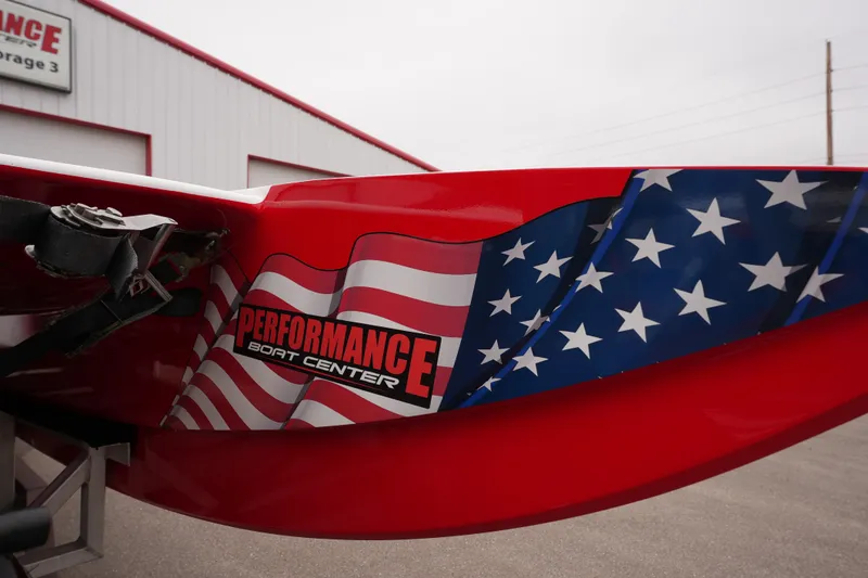 Slide: The Image of 2019 Wright Performance 320 Race boat with American flag design and Performance Boat Center logo. - 21