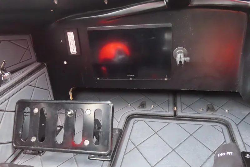 Slide: The Image of Interior of 2019 Wright Performance 320 Race boat with Garmin display and footrest. - 30